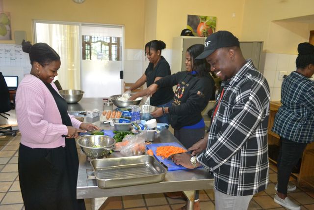 Some second-year Scholars preparing vegetables at the Sustainability Institute in April, after learning about the concept of Ilima. Ilima is a Xhosa practice of communal farming or helping someone needing help, in their home. The term describes the collaborative effort of community members working together.